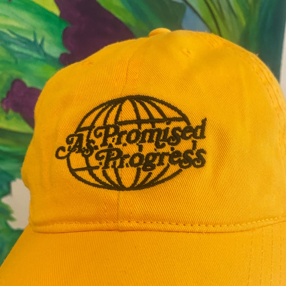 yellow hat baseball cap style - leadership lean in